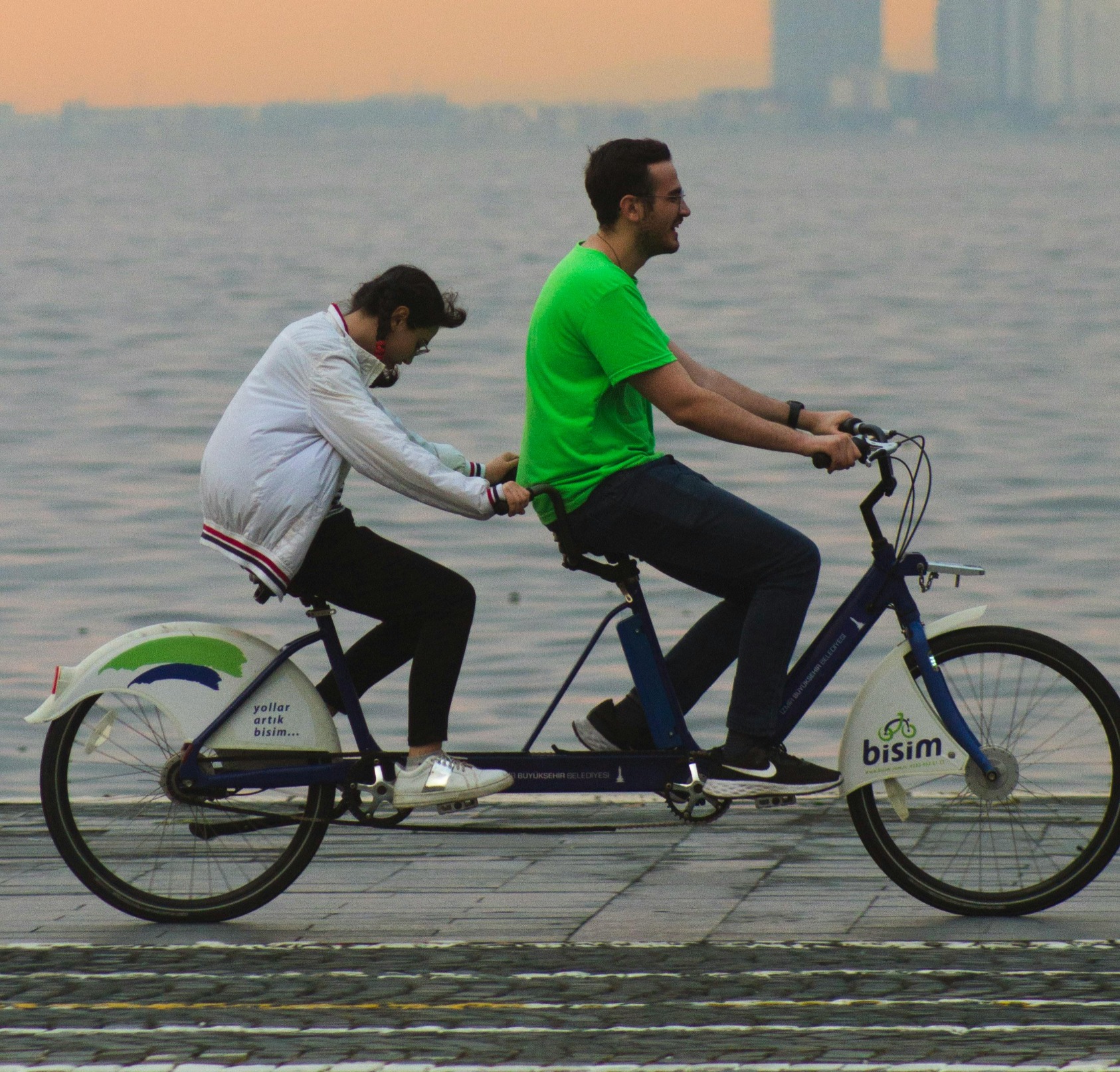 couple on tandem bike ride