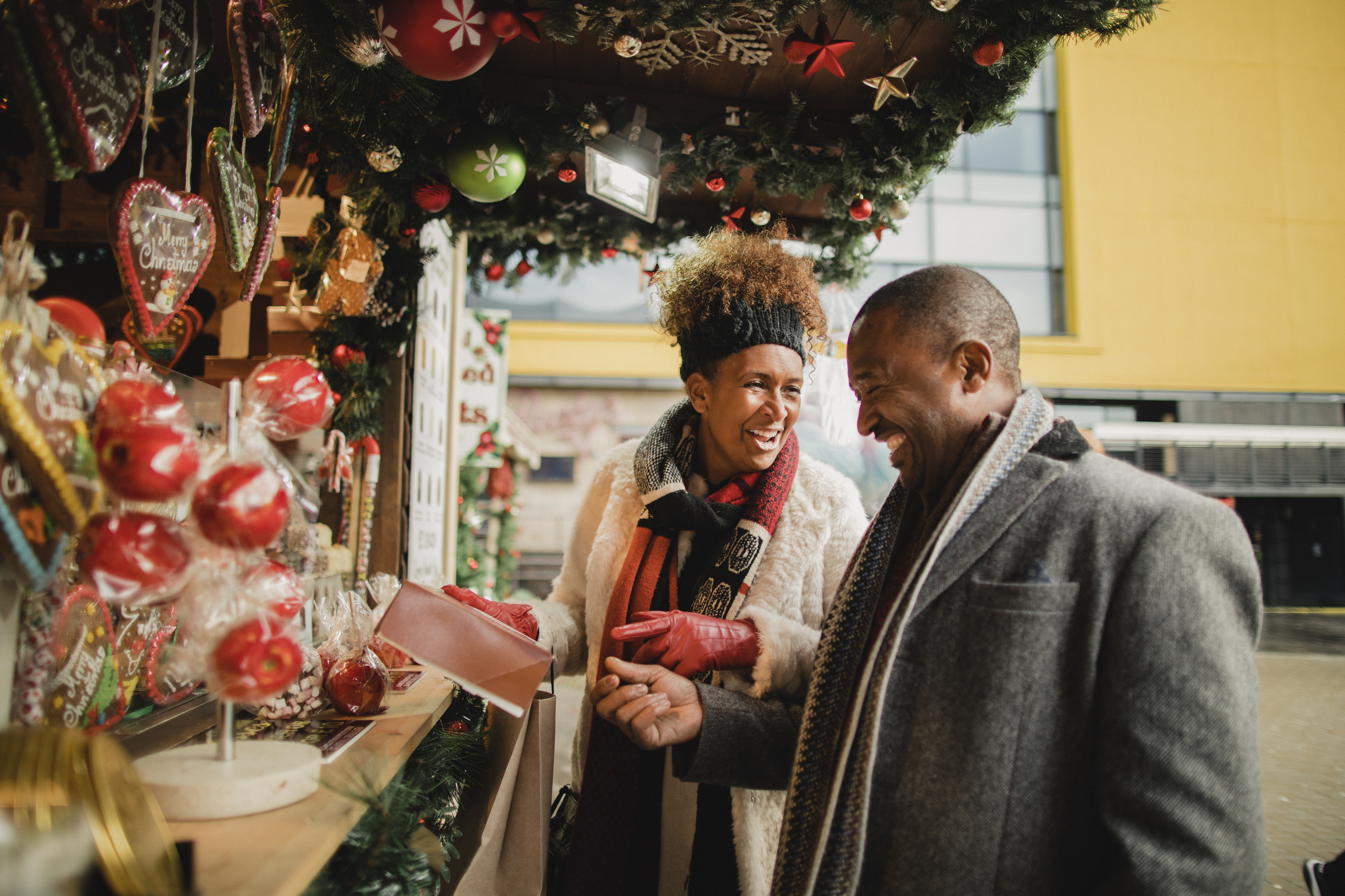 man and woman couple buying christmas gift